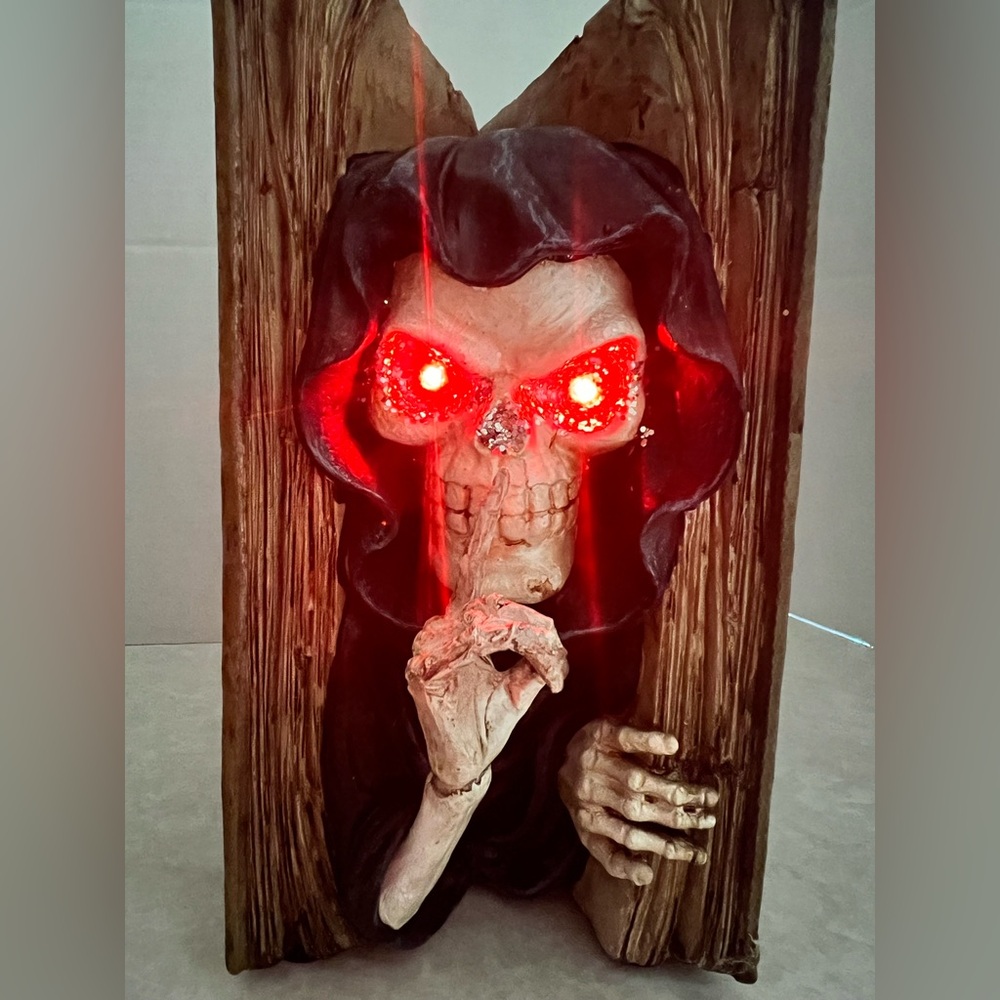 Spooky Red-Eyed Skeleton Book Art